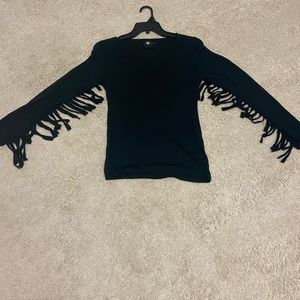Western top with fringe.